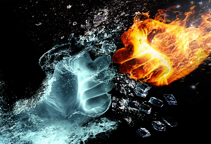 Image of two fists, fire and ice