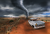 Image of car driving away from a tornado to signify the destruciton of an affair